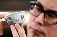 Collector pays $ 36 million for tea cup