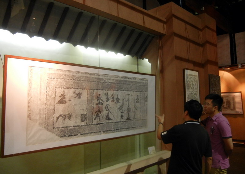 Han stone engraving art displayed in Suzhou