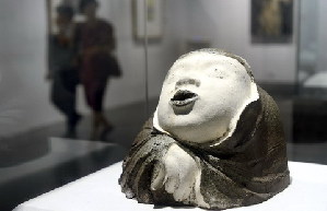 Han stone engraving art displayed in Suzhou