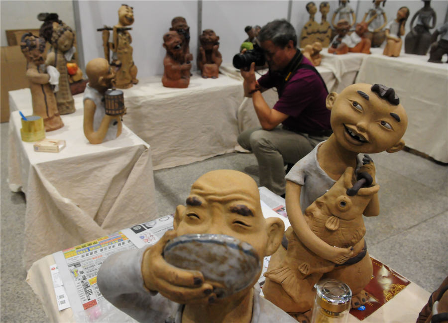 Vivid pottery figurines exhibited in Shandong