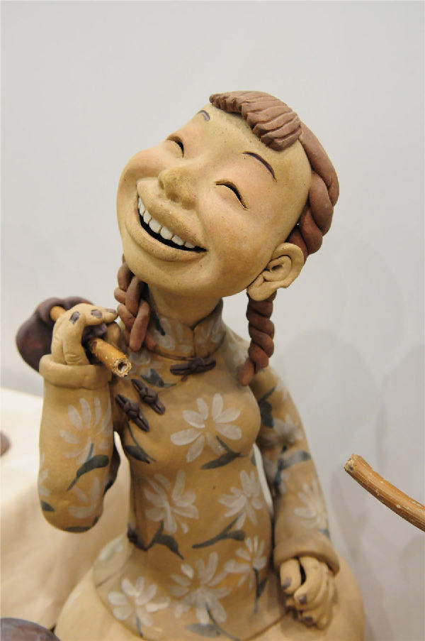 Vivid pottery figurines exhibited in Shandong