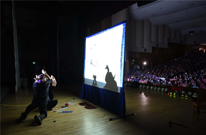 Hand shadow shows at his fingertips