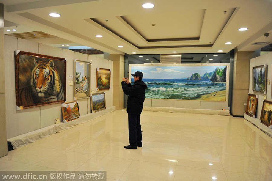 Paintings by DPRK's Mansudae Art Studio debut in Shenyang