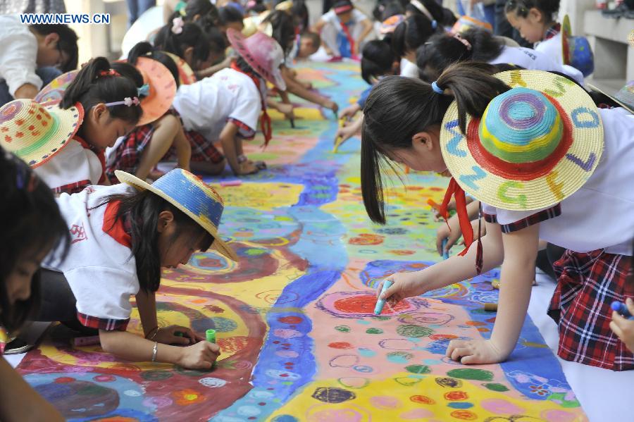 Painting event held to greet upcoming Int'l Children's Day in Beijing