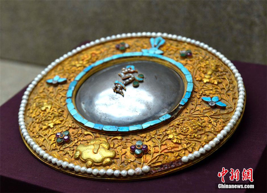 Tibetan gold silverware on display in Lhasa