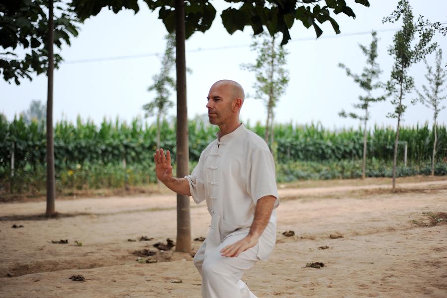 People practice tai chi in Henan