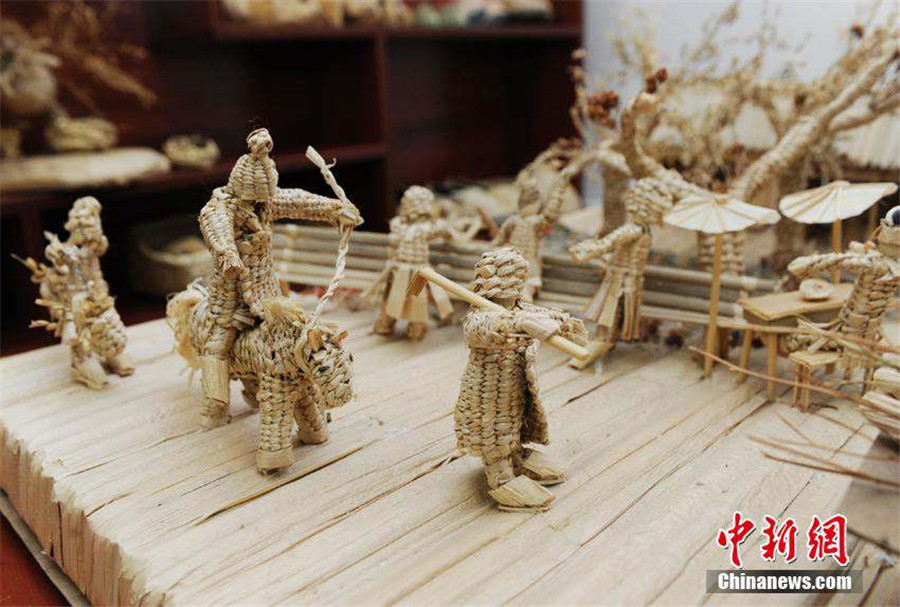 Straw artwork portrays ancient painting scenes