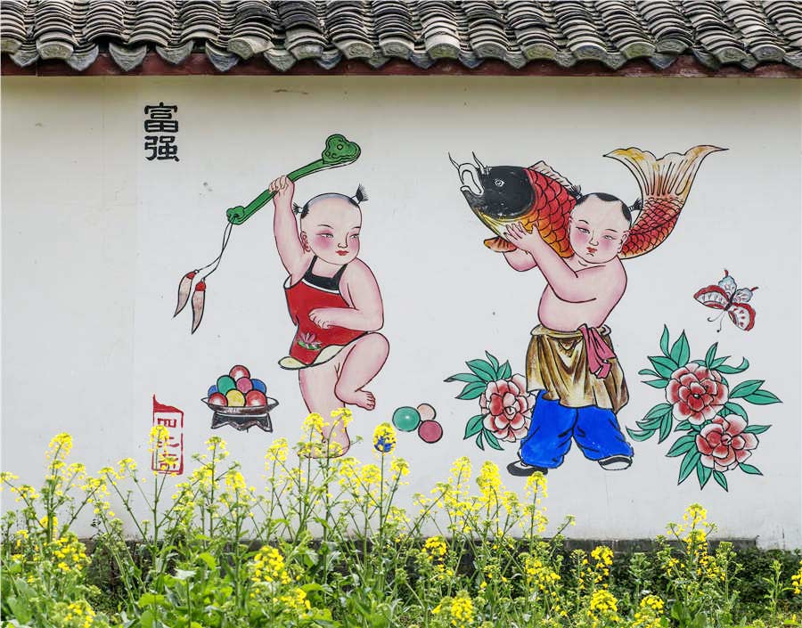 New Year paintings decorate cottage walls in spring