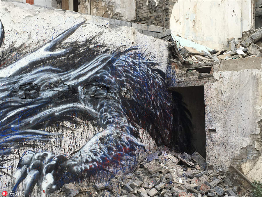 Graffiti works revive dilapidated walls