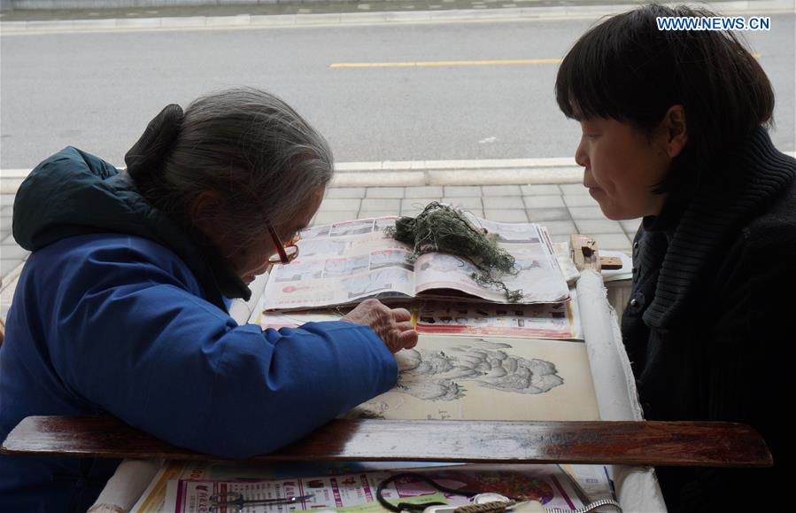 Embroidery works of artist Liang Xuefang