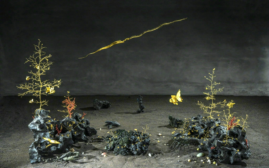 Gold and wood insects fly in Beijing's museum
