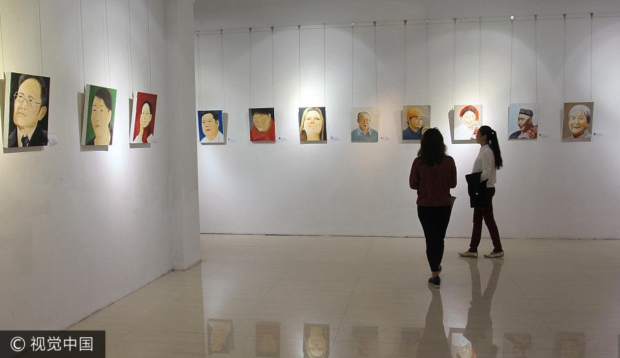 Oil paintings depict China's most inspiring role models