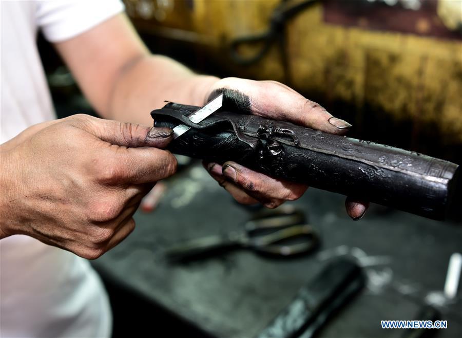 Ink-making artist Chen Jhun-Tien in SE China