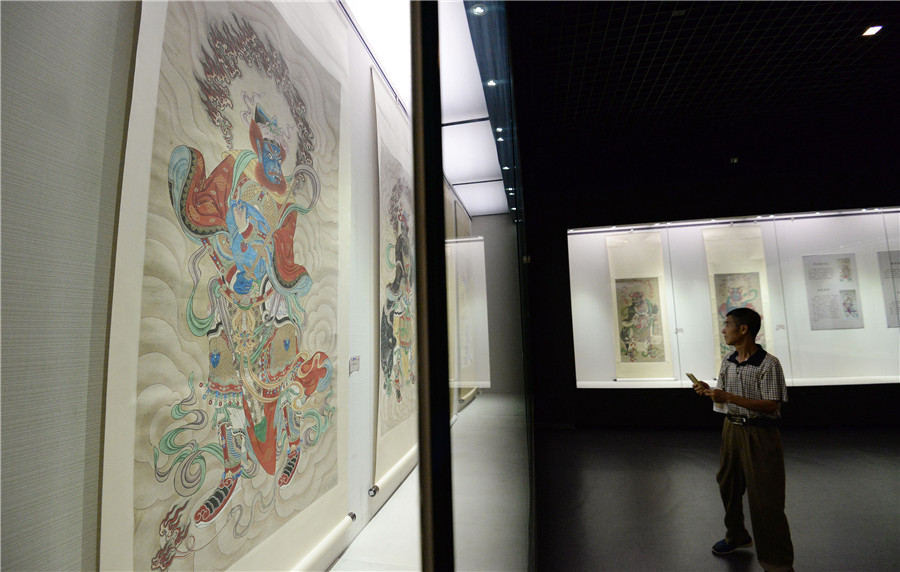 Buddhist paintings on display in N China