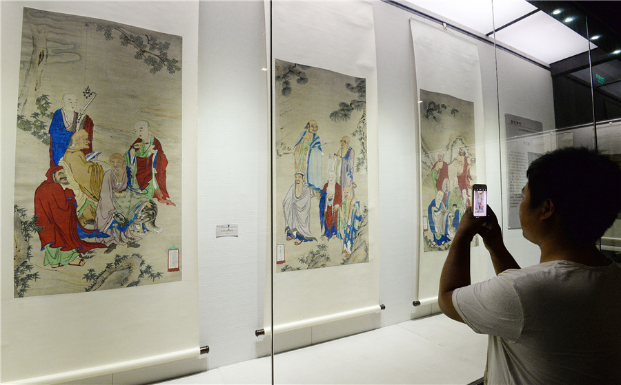 Buddhist paintings on display in N China