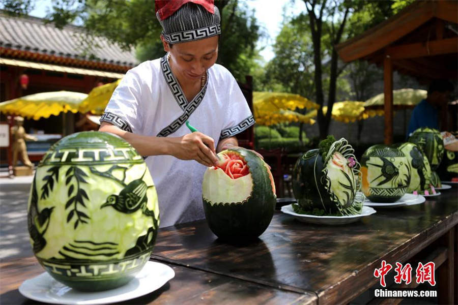 Vivid landscapes carved on watermelons
