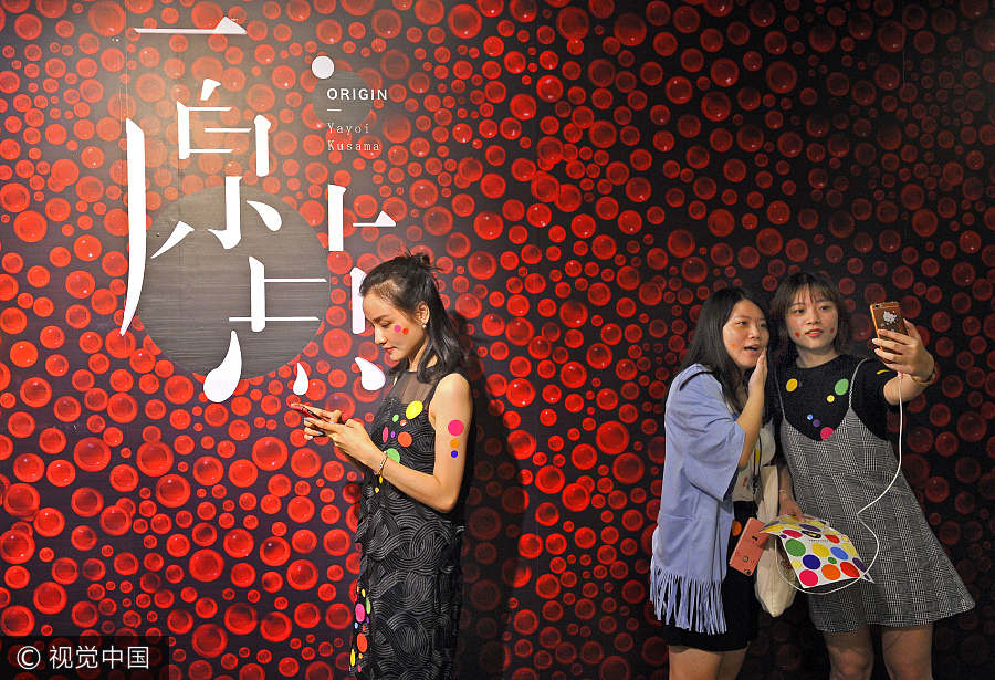 Japanese artist Kusama displays her polka dot artworks in Fuzhou