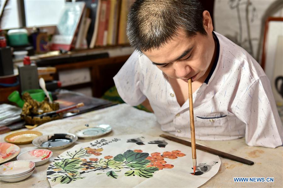 Man learns traditional Chinese art skills to change fate