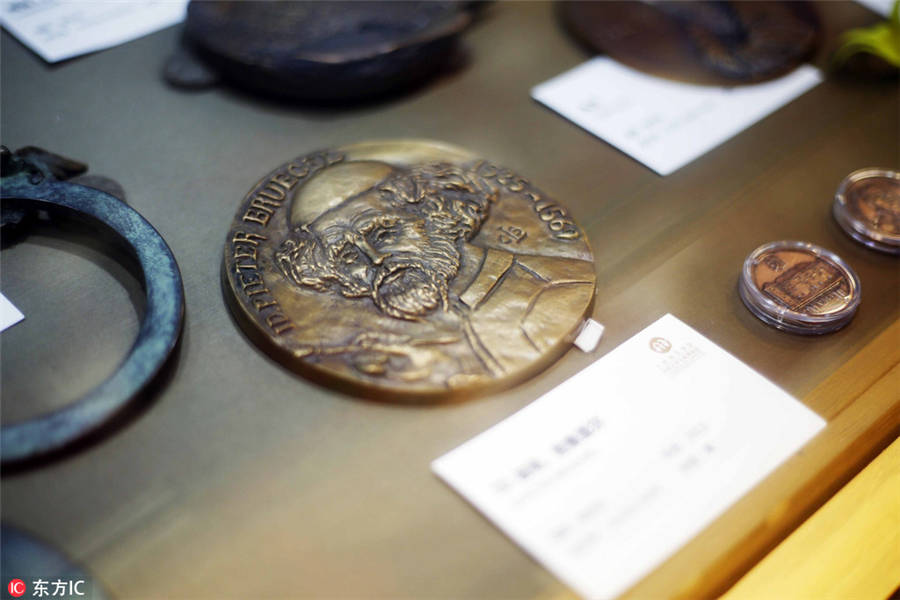 Coin art exhibition opens in Shanghai