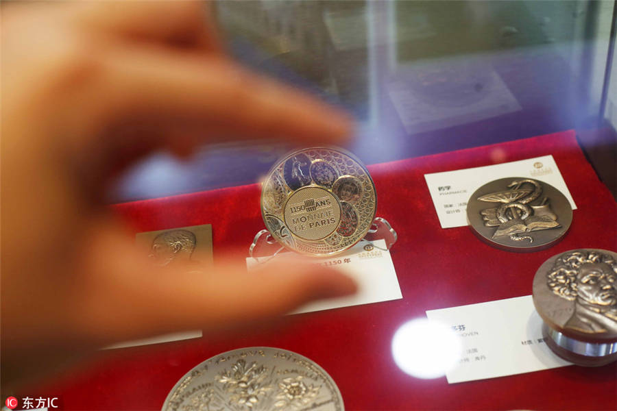 Coin art exhibition opens in Shanghai