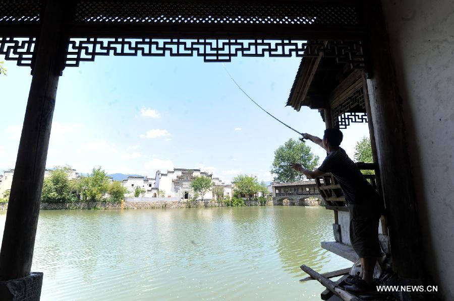 Ancient buildings rebuilt in E China village