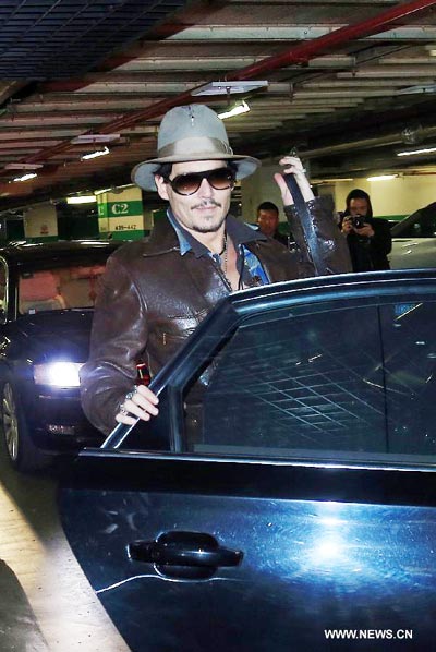 Johnny Depp arrives in Beijing to promote film 'Transcendence'