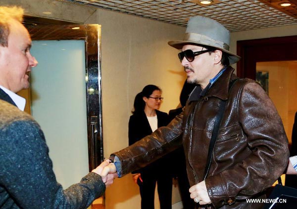 Johnny Depp arrives in Beijing to promote film 'Transcendence'