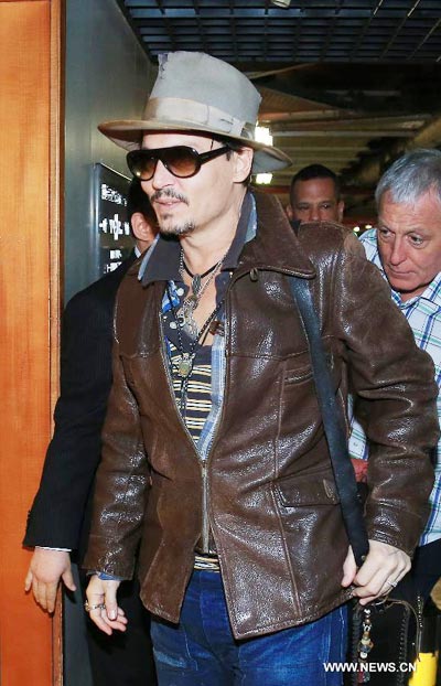 Johnny Depp arrives in Beijing to promote film 'Transcendence'