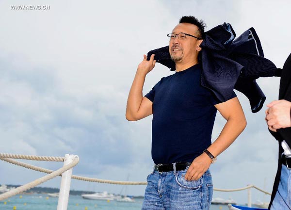 Jiang Wen promotes 'Gone with the bullets' in Cannes