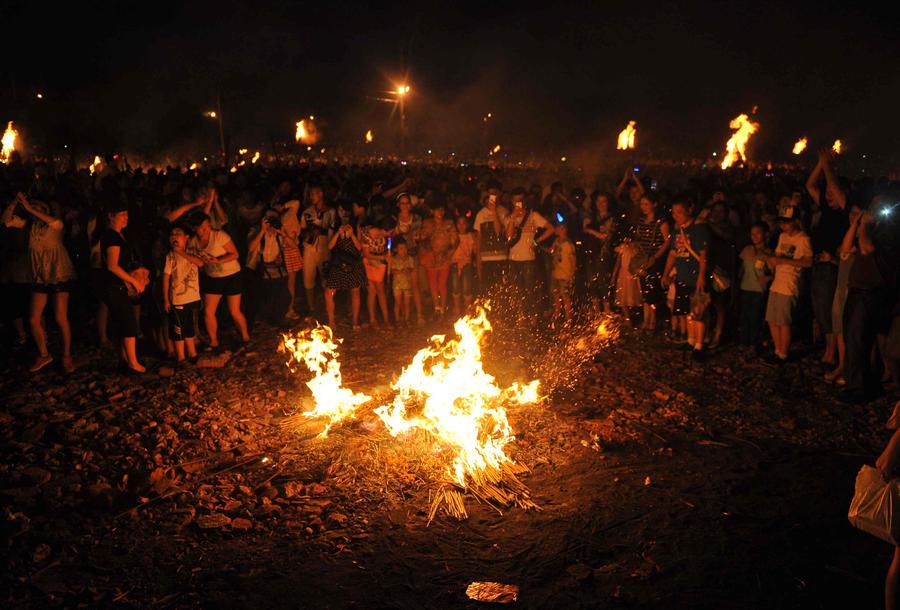 Image result for Torch Festival of the Yi Ethnic Minority 彝族火把节