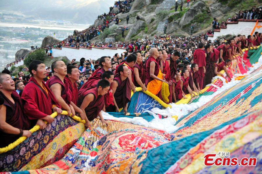 People celebrate Shoton Festival at Drepung monastery, Tibet