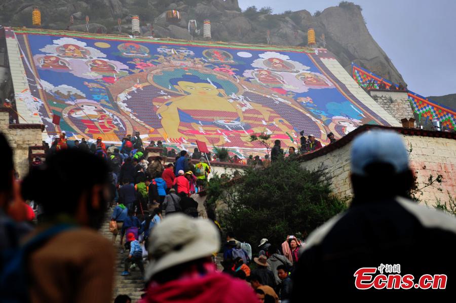People celebrate Shoton Festival at Drepung monastery, Tibet