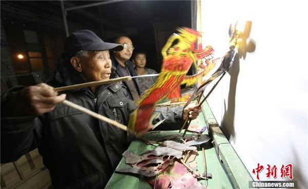 Old craftsman worries about future of shadow puppetry