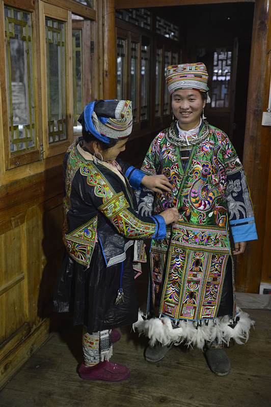 Jiang Laoben and her exquisite craftsmanship of Miao's 'hundred-bird dress'