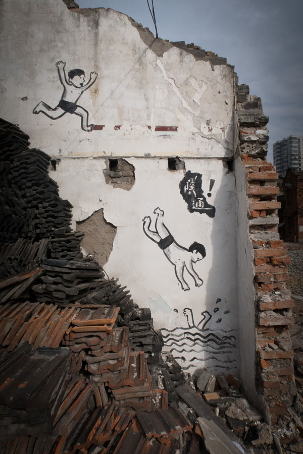 Graffiti on dismantled Shanghai Shikumen buildings