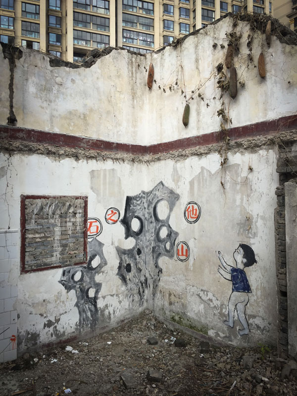 Graffiti on dismantled Shanghai Shikumen buildings