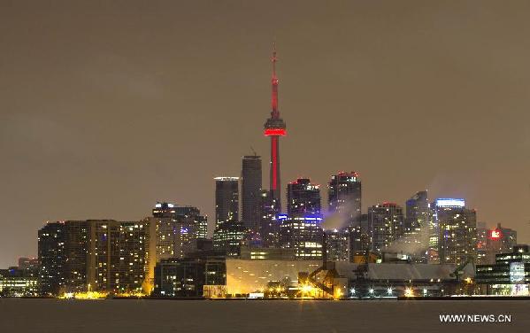 Toronto's CN Tower lights up to celebrate Chinese lunar New Year