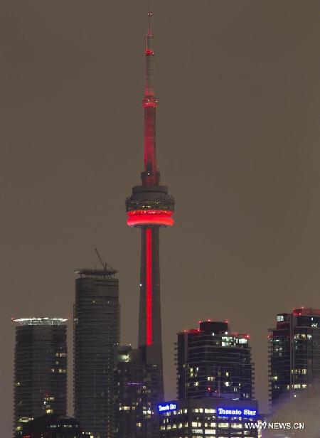 Toronto's CN Tower lights up to celebrate Chinese lunar New Year