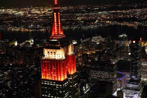 Empire State Building turns red and yellow