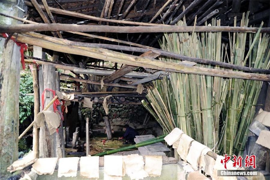 Water wheel keeps on turning at old papermaking workshop