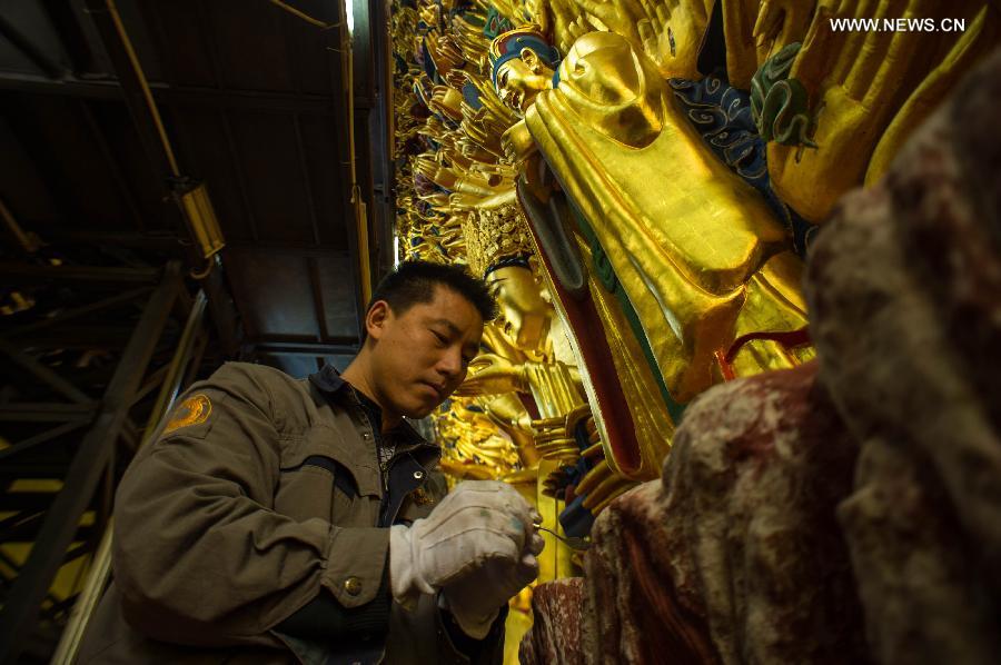 Repair of Thousand-hand Kwan-yin sculpture to finish in China's Chongqing