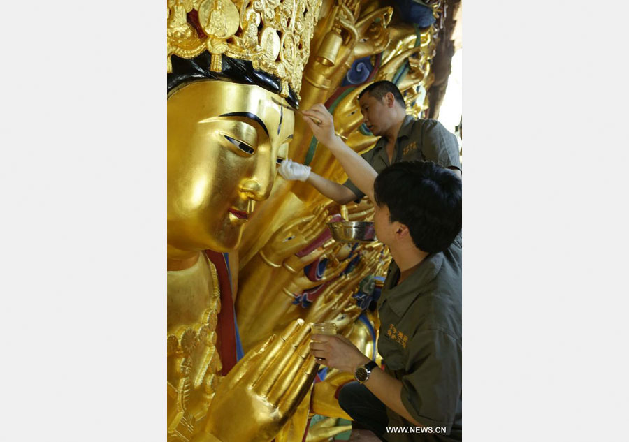 Restoration work of Guanyin sculpture enters final phase