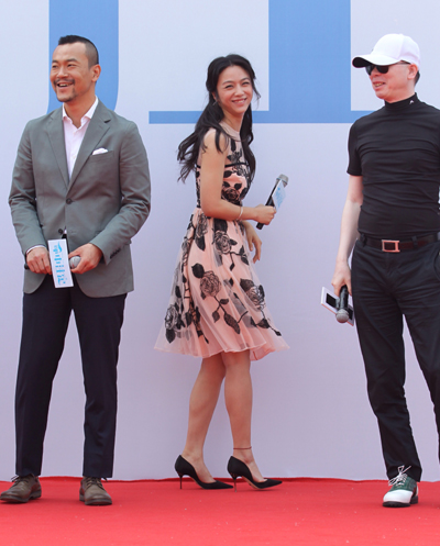 Director Feng touts film with edgy laughs