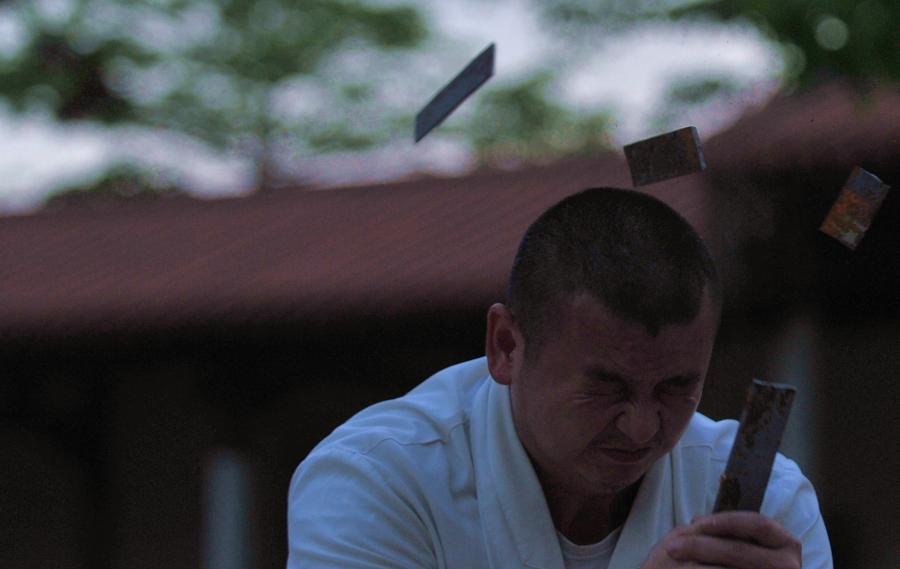 Monks practice martial art at Quanzhou Shaolin Temple