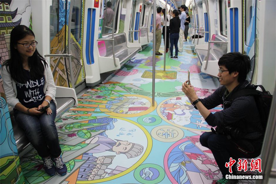 Train filled with cartoon art inspired by Maritime Silk Road