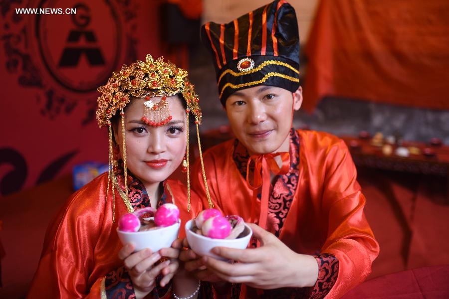 Group traditional Han wedding held in China's Rucheng