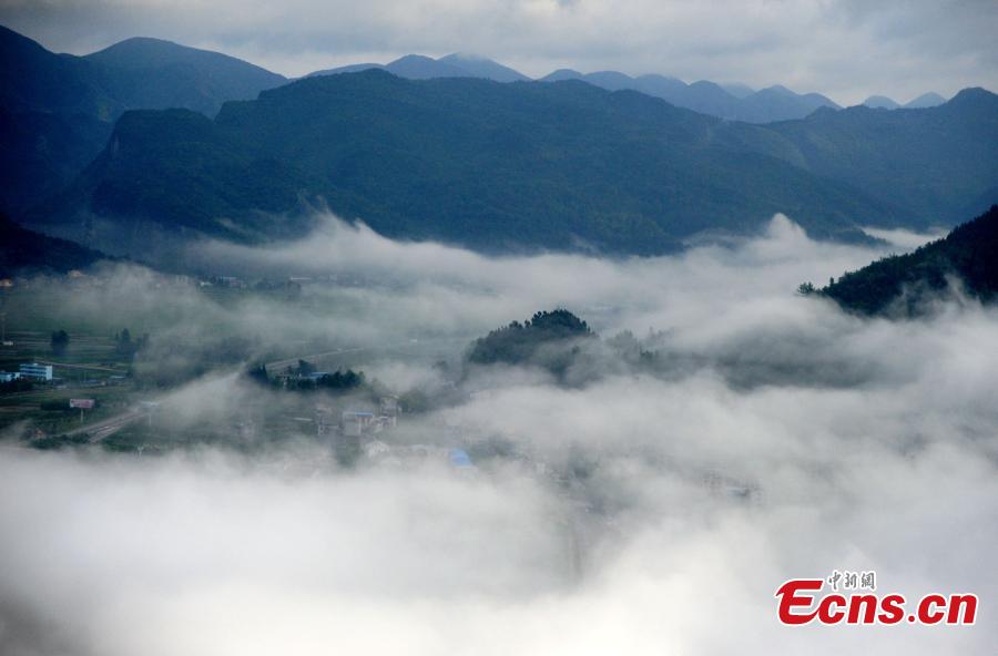 Clouds and fog create remarkable mountain scene