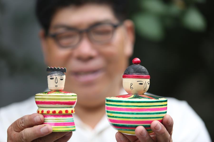 Ancient wood-cut toys still popular in Southern Shandong