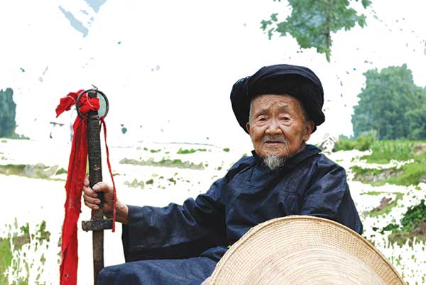 Folk singer pushes to preserve the voice of a Miao epic