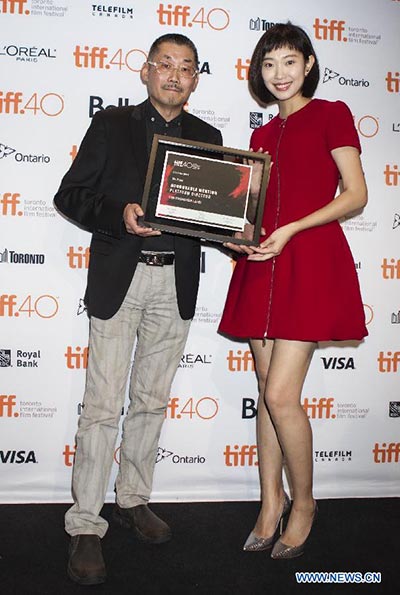 China's He Ping receives honourable mention of Platform Director